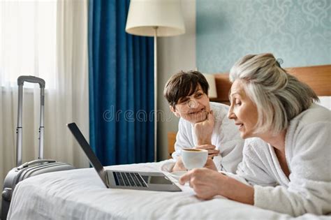 Senior Lesbian Couple Engaged With Laptop Stock Photo Image Of Learning Home 316445124