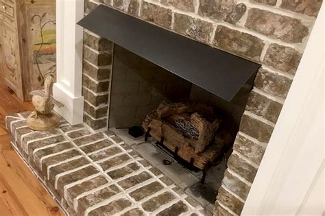 How Fireplace Hoods Protect Your Hearth From Heat Damage