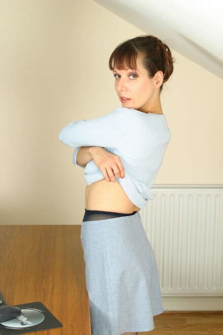 Stunning Mature Sexy Secretary Cindy Stripping And Posing In See Through Nylons At Work