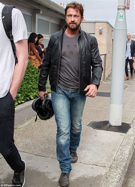 Gerard Butler Tries To Avoid Cameras But Flirts Up A Storm Again In