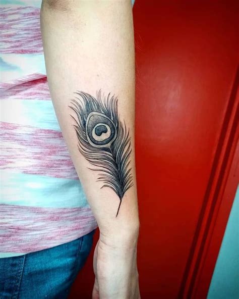 Pin On Mandala Hand Tattoo For Women In 2024 Feather Tattoos Feather