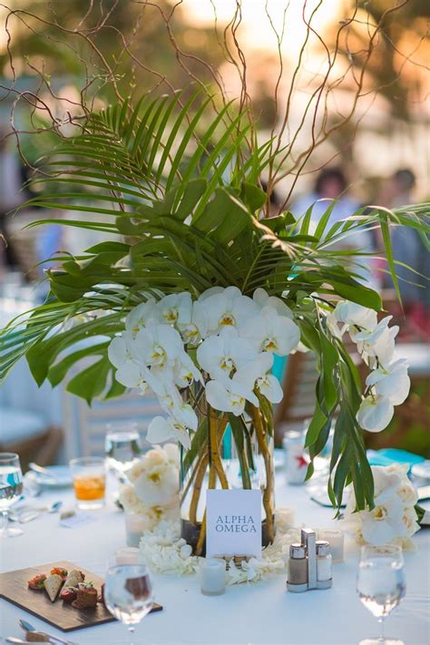 Tropical Wedding Centerpiece with Palm Leaves, Monstera Leaves, White ...