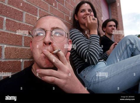 Austin Texas Usa High School Students Sneaking A Smoke Outside In