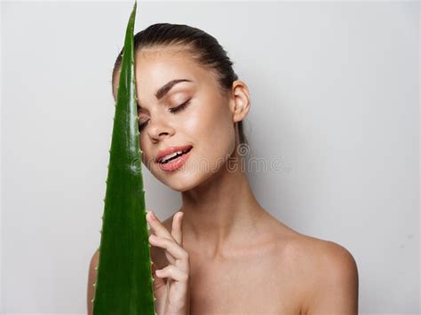 Attractive Woman With Aloe Leaf And Closed Eyes Naked Shoulders Clear Skin Stock Image Image