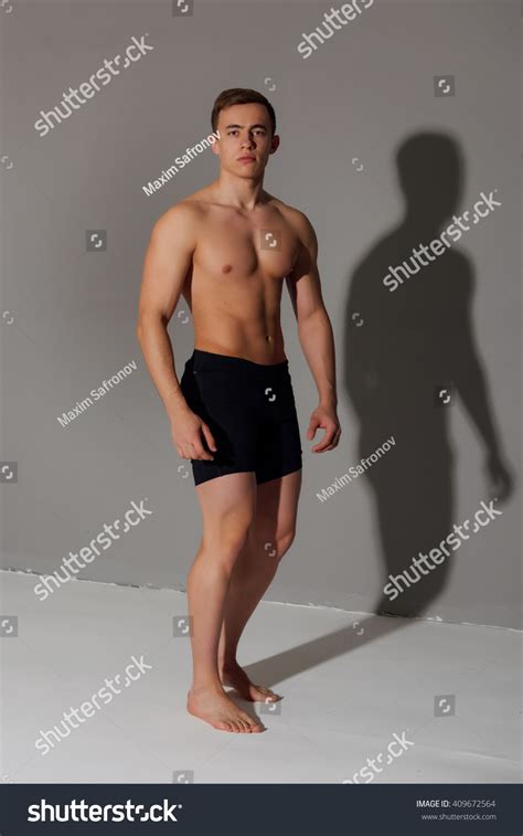 Sports Man Showing His Naked Muscular Stock Photo 409672564 Shutterstock