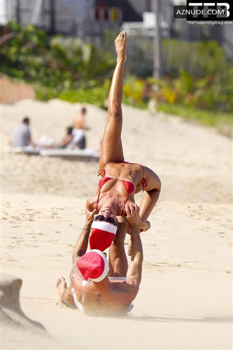 Izabel Goulart Sexy Gets Into The Christmas Spirit Wearing A Tiny Red Bikini At The Beach In St