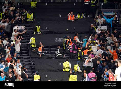 Tottenham Hotspur fans clash with Marseille fans in the stands during ...