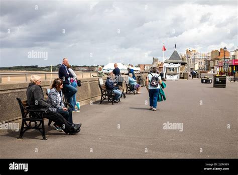 People walking along the Promenade in Burnham On Sea, Somerset Stock ...