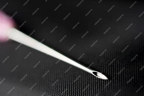 Иглы шприца на черном | Бесплатно Фото