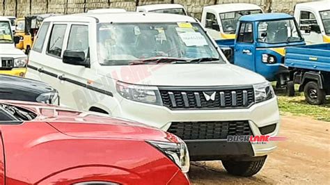 2022 Mahindra Bolero NEO With New Logo - Spied At Dealer Yard