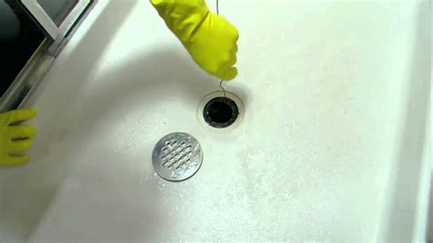 how to unclog a bathtub from hair