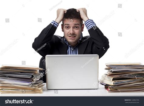 young businessman pulling  hair  stock photo