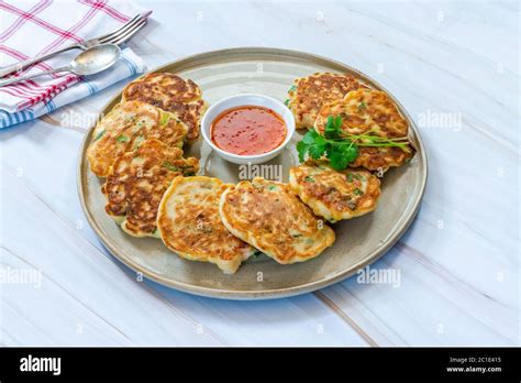 Prawn And Sweetcorn Fritters With Sweet Chilli Sauce Stock Photo Alamy