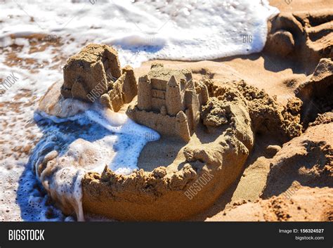 Waves Wash Away Sand Image And Photo Free Trial Bigstock