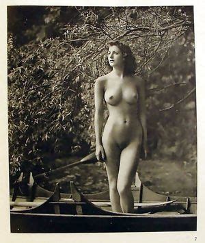 Nude Women Floating In A Boat