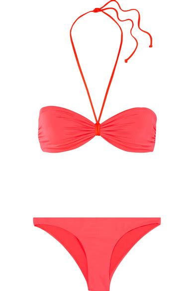 Bella Thorne Flaunts Her Slender Figure In A Red String Bikini As She Lazes By The Pool In Miami