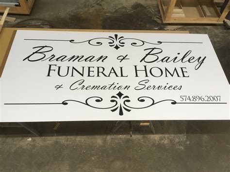 Neighbors debate the new signage for the waldo funeral home 27