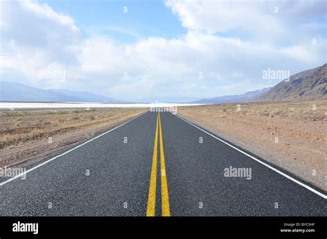 closeup   yellow road dividing  stock photo alamy
