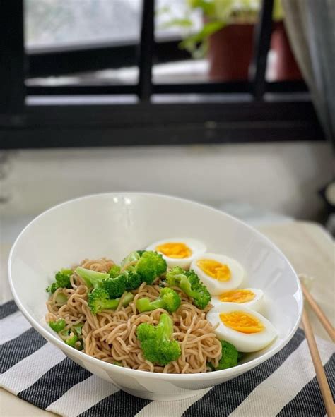 Singapore Food Mee Goreng With Broccoli And Boiled Eggs