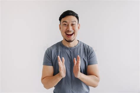 Wow And Surprised Face Of Man In Grey T Shirt With Hand Point On Empty