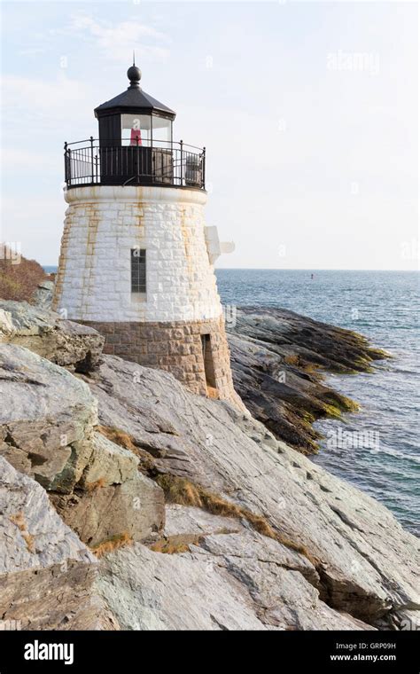 Lighthouse On A Rocky Shore Stock Photo Alamy