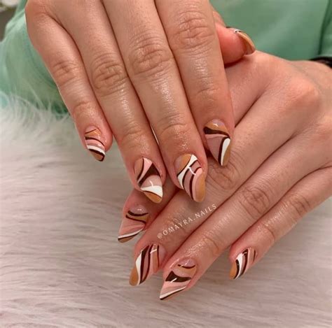 Chic And Timeless Nude Almond Nail Designs