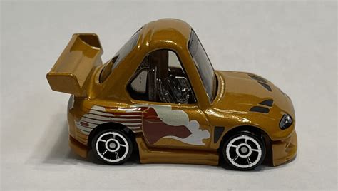 Машинка Базова Hot Wheels Fast Furious 94 Toyota Supra Tooned 1 64 HTF27 Gold купити в