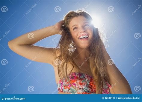 Beautiful Smiling Blonde In Floral Bikini On The Beach Stock Image
