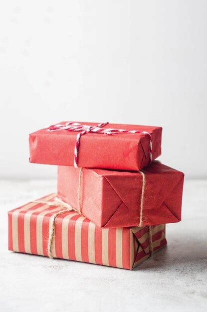 Premium Photo Modern Christmas Wrapped Presents With Natural Decor In