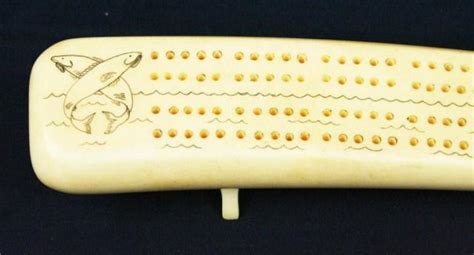 INUIT WALRUS TUSK CRIBBAGE BOARD SCRIMSHAW
