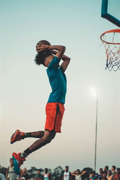 Photo Of Man Doing Dunk · Free Stock Photo
