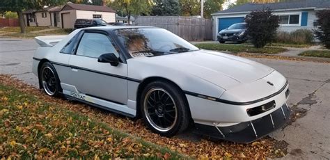 Kenneth S 1987 Pontiac Fiero Holley My Garage