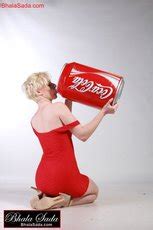 Smoking Hot Blonde Girl Loves Posing With A Big Coke Can Photos