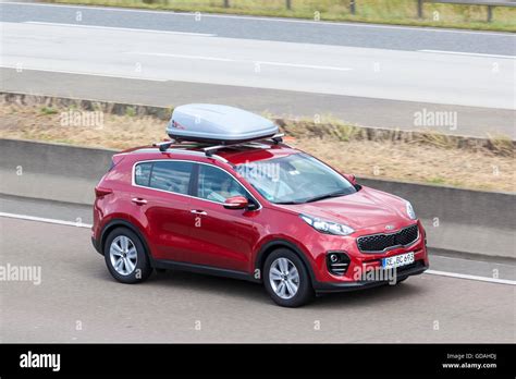 Kia Sportage With A Roof Box Stock Photo Alamy