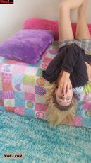 Hot Blonde Chick Showing Her Big Tits In A Fishnet Shirt 15 Photos