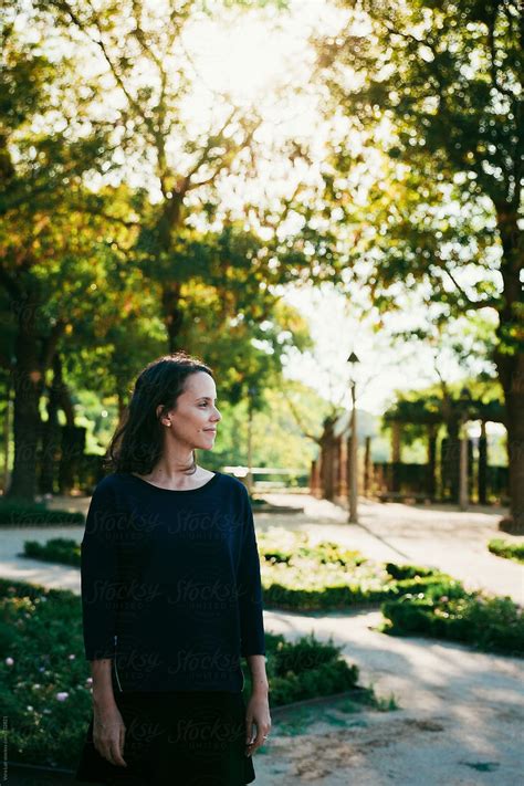 Pretty Brunette In A Park By Stocksy Contributor Vera Lair Stocksy