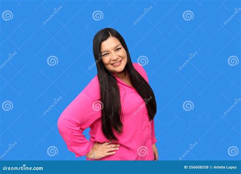 Successful 40 Year Old Latina Woman With Long Straight Brown Hair Smiles And Poses For The