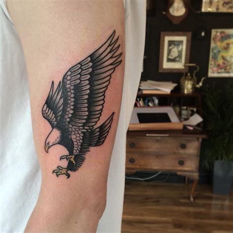 eagle tattoo designs meanings spread  wings