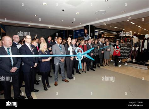 Primark Management Cutting The Ribbon At The Opening Day Of The New