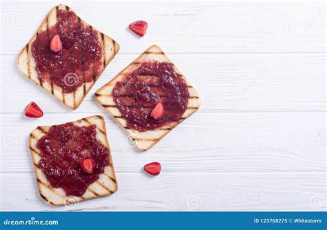 Toast with strawberry jam stock image. Image of fresh - 123768275