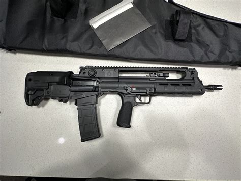 What sights are you using? I’m debating between ACOG or EOTECH Hybrid