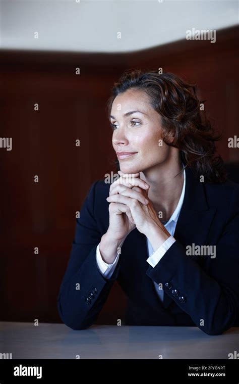 Thinking About Her Court Case Mature Legal Woman Looking Away From The