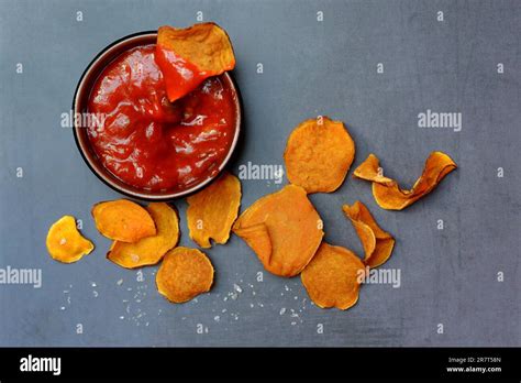 Sweet Crisps And Salsa Sauce Stock Photo Alamy