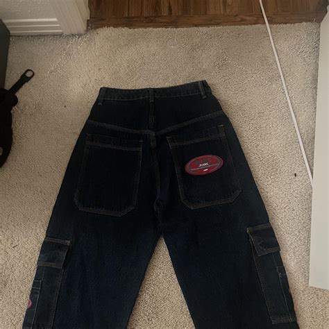Greyish black wake jeans, red logo with cargo style... - Depop