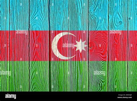 Azerbaijan flag painted on old wood plank background. Brushed natural ...