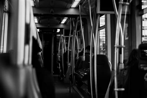 Gray Image of People in an Old Bus Interior · Free Stock Photo