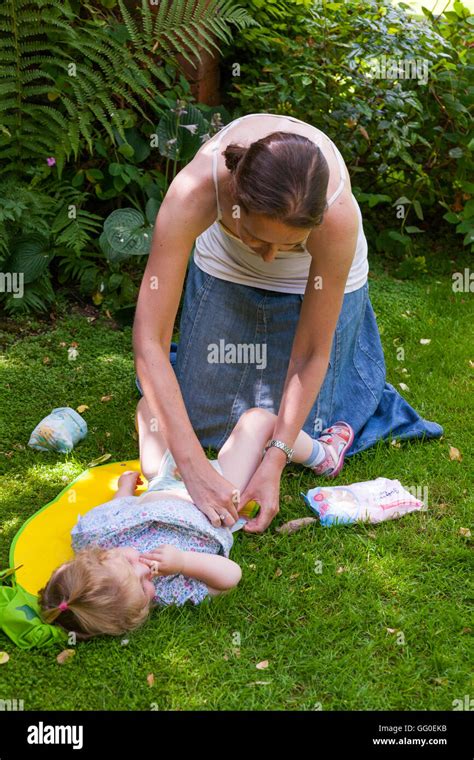 Mum Mother Parent Carer Changing Nappies Nappy Change Of Baby Toddler