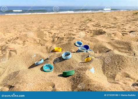 Plastic Bottle Caps Discarded on the Beach, Ecological Problem Stock ...