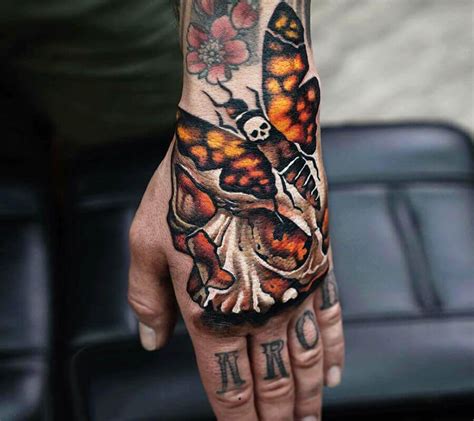 Traditional Skull Moth Tattoo