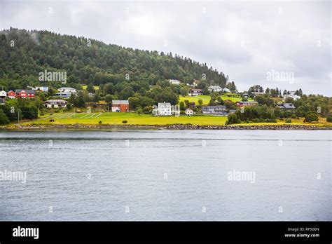 Landscape with village, forest and fjord in Norway Stock Photo - Alamy